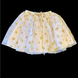 Popatu lined (light pink) taffata skirt. White, gold stars.  Size 6X/7.